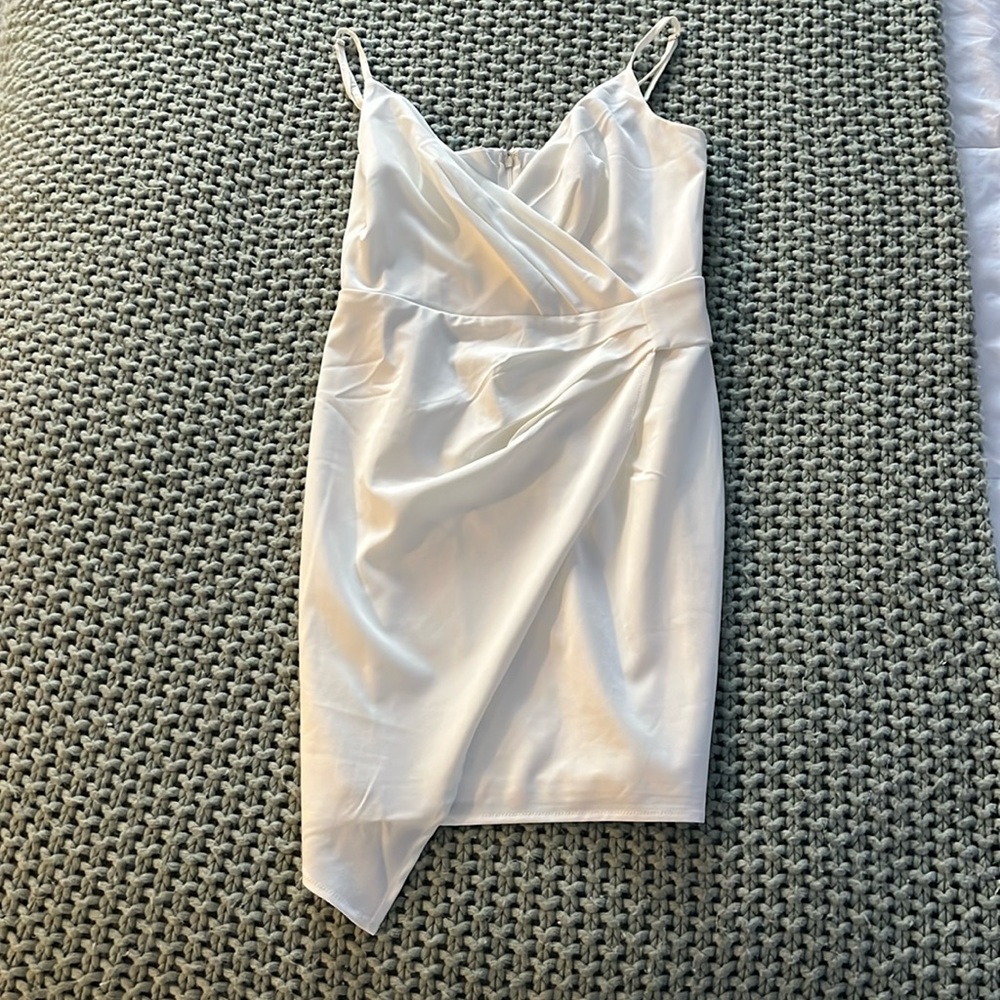 Blue Blush, white color, size small mini dress.